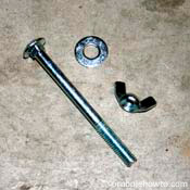 Picture of bolt, washers, and wing nut.