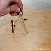 Marking the table's hole.