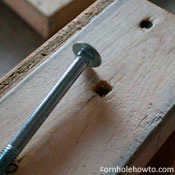 Result of hammering carriage bolt in place.